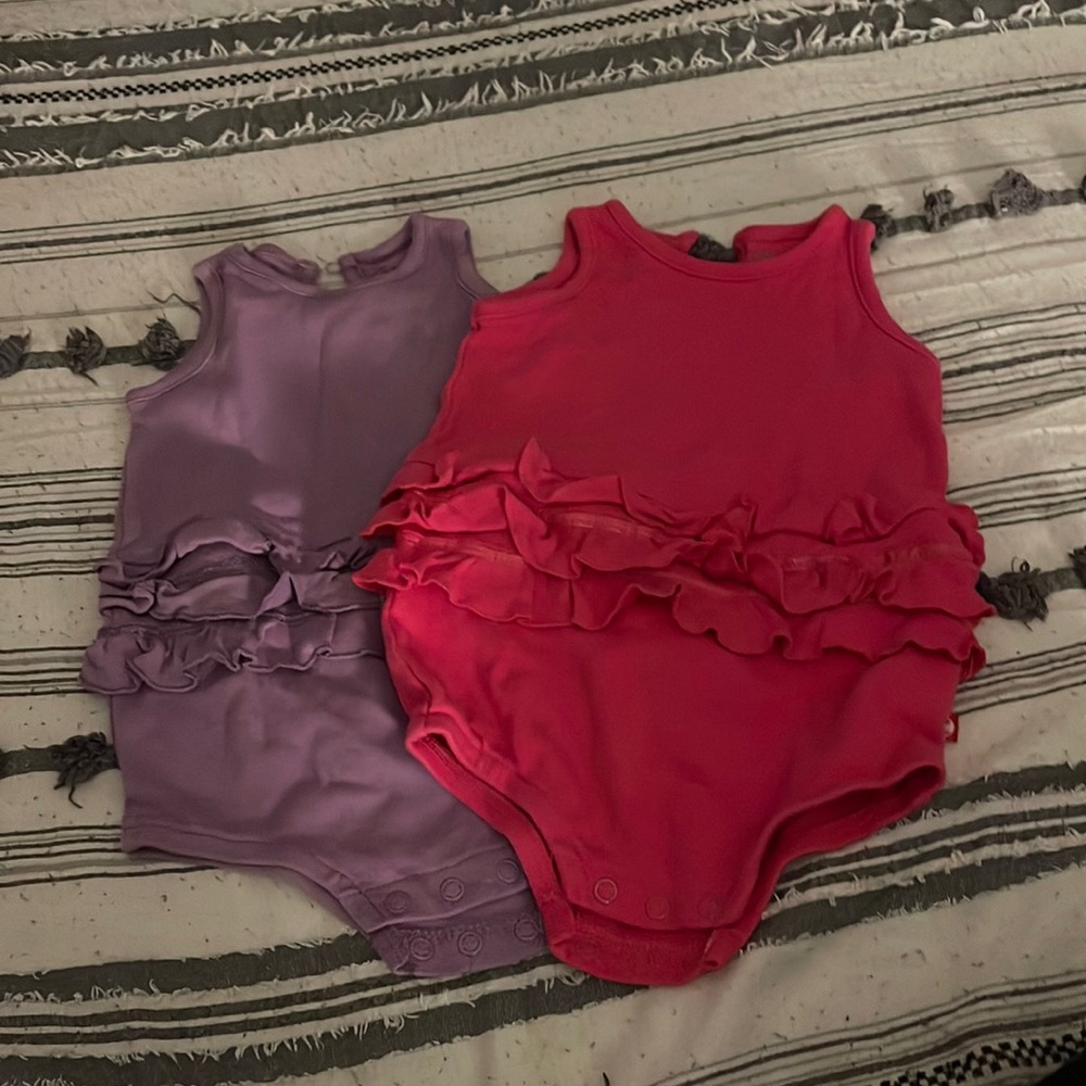 Two cute baby girl body suits